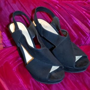 A.N.A. wedge heels
